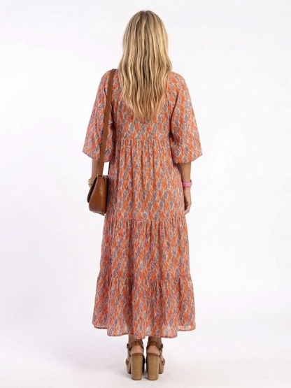 Amara | Vestido Midi de Volantes con Escote en V de Estampado Geométrico